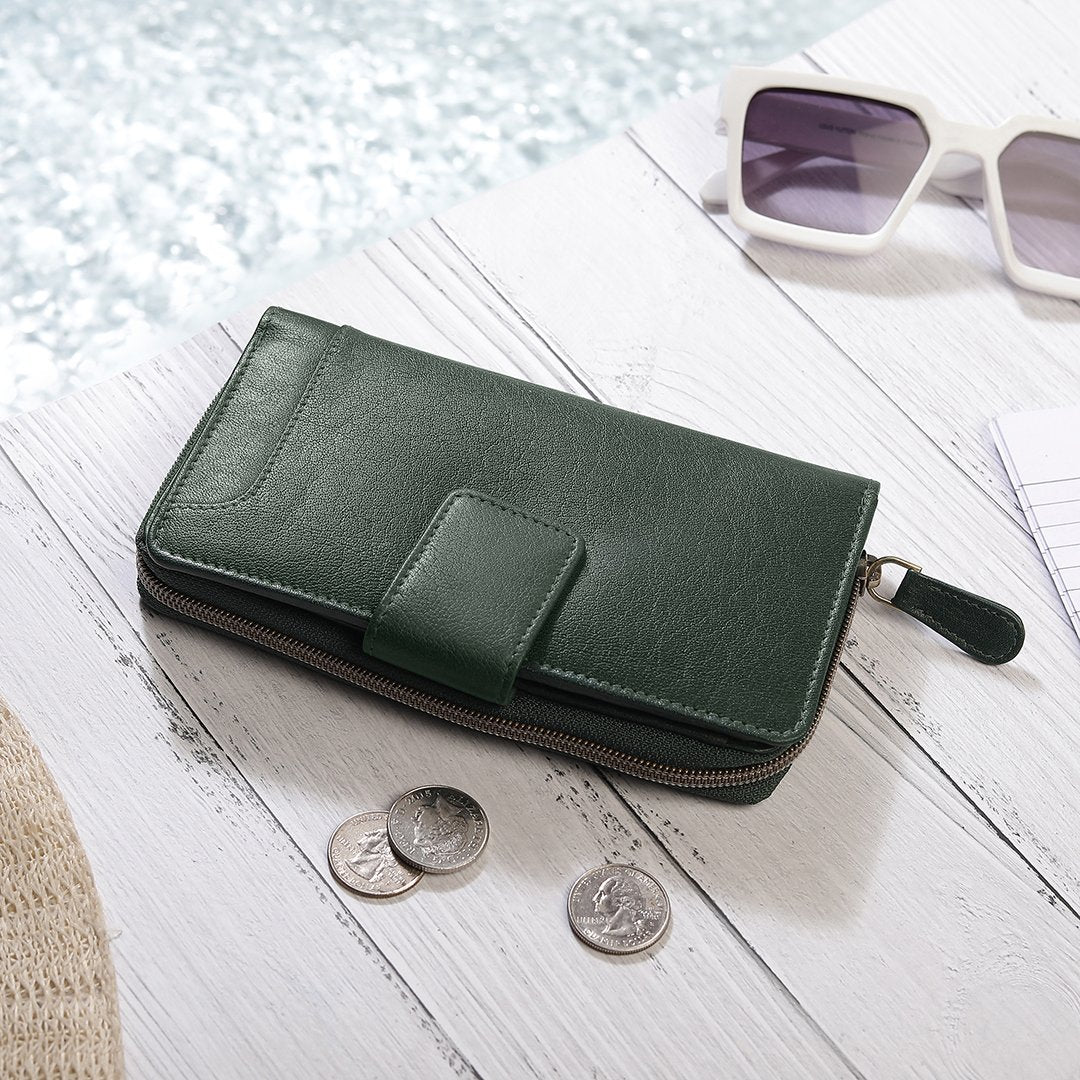 The Velura Large Green Zip Around Purse is crafted from Genuine Leather