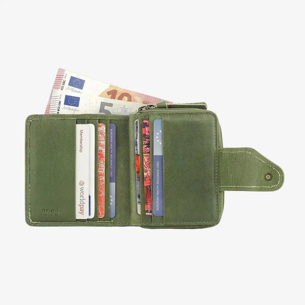 Green wallet with cards and money on a white background
