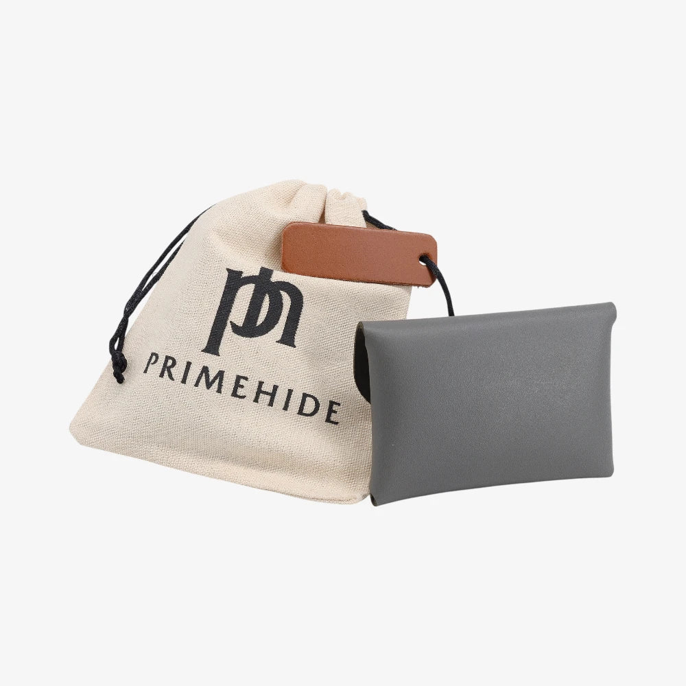 Back view of grey leather coin purse with textured finish and branded pouch