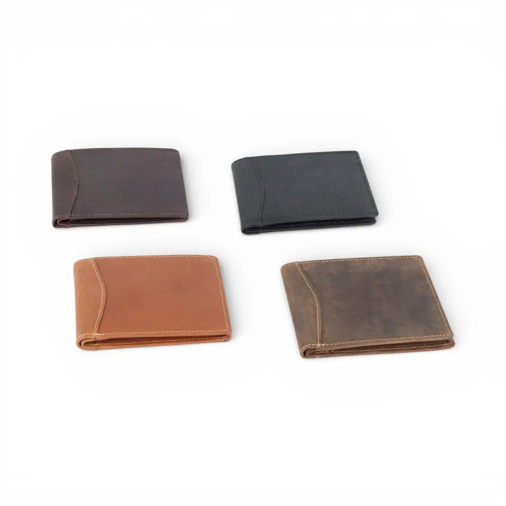 Four leather wallets in different colours on a white background