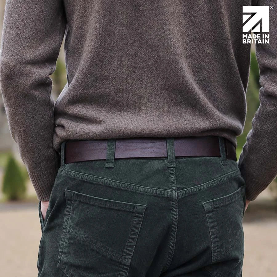 Men’s brown 40mm full-grain Italian leather belt worn with navy trousers
