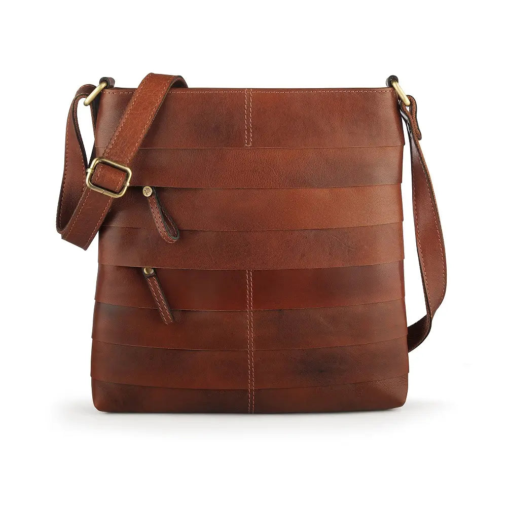 Full front view of the Boho Layered Leather Bag - Ridgeback, showing the layered panel design, brass-toned hardware, and adjustable shoulder strap in detail.
