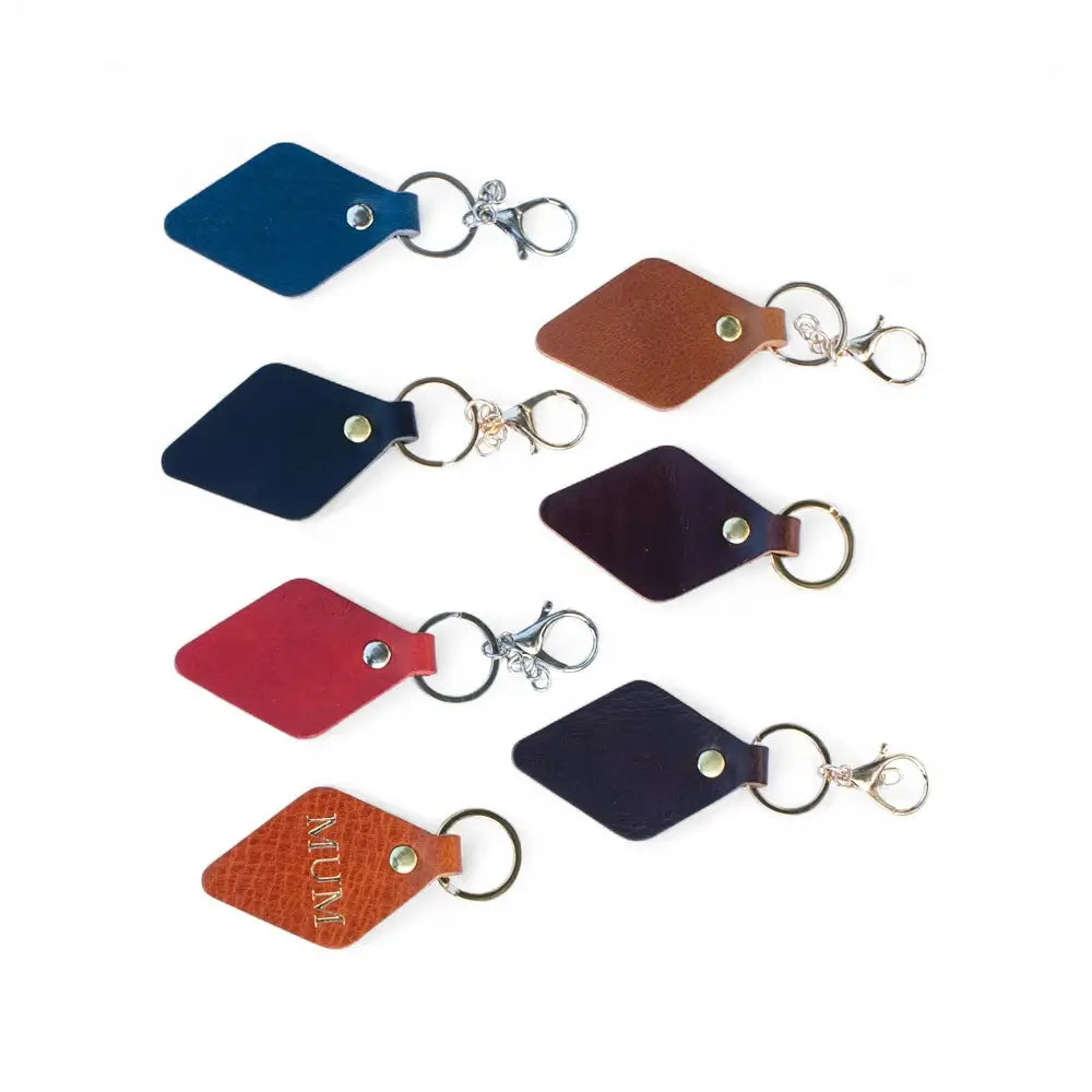 Set of diamond-shaped keychains in various colors on a white background