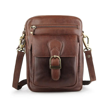 Front view of brown leather crossbody messenger bag with buckle-style flap pocket and zip compartment