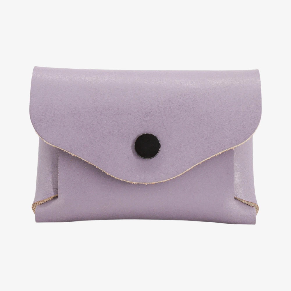 Lilac leather coin purse with textured finish and snap button flap closure