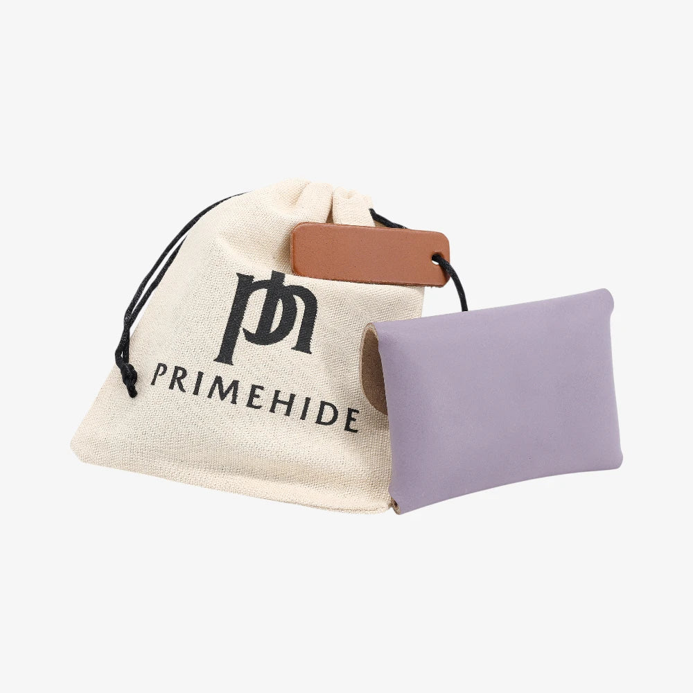 Back view of lilac leather coin purse with textured finish and branded pouch