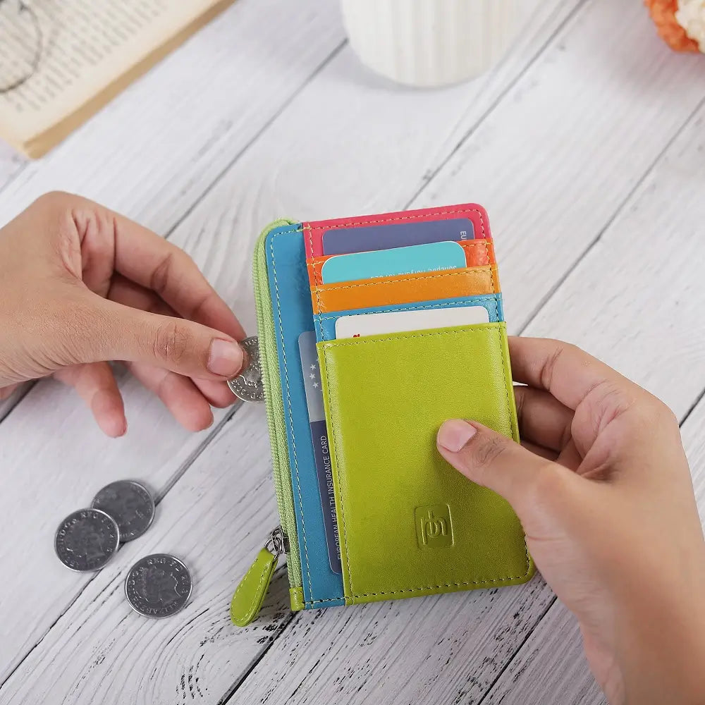Lime Card Holder Purse with coins on a wooden surface