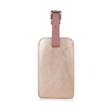 Pink luggage tag with a pink strap on a white background