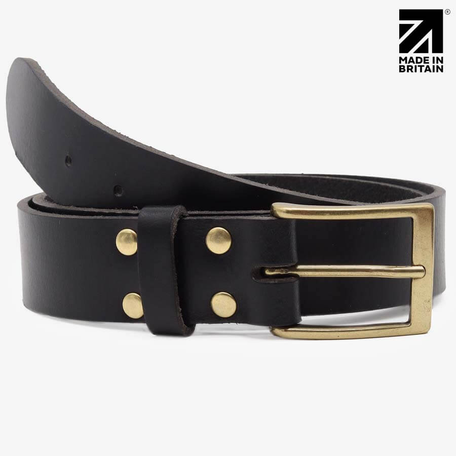 Close up of black leather belt buckle and waxed edge finish — PRIMEHIDE