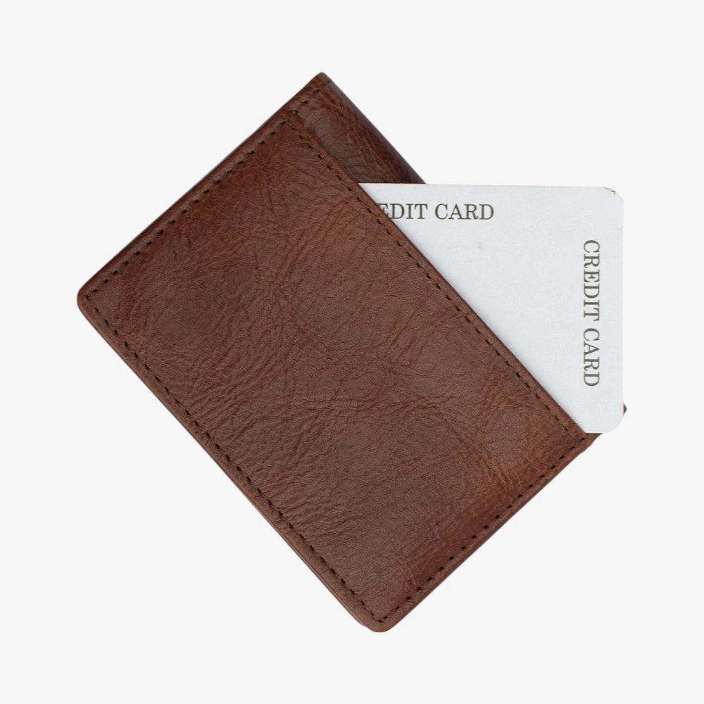 Brown leather cardholder with two credit cards on a white background