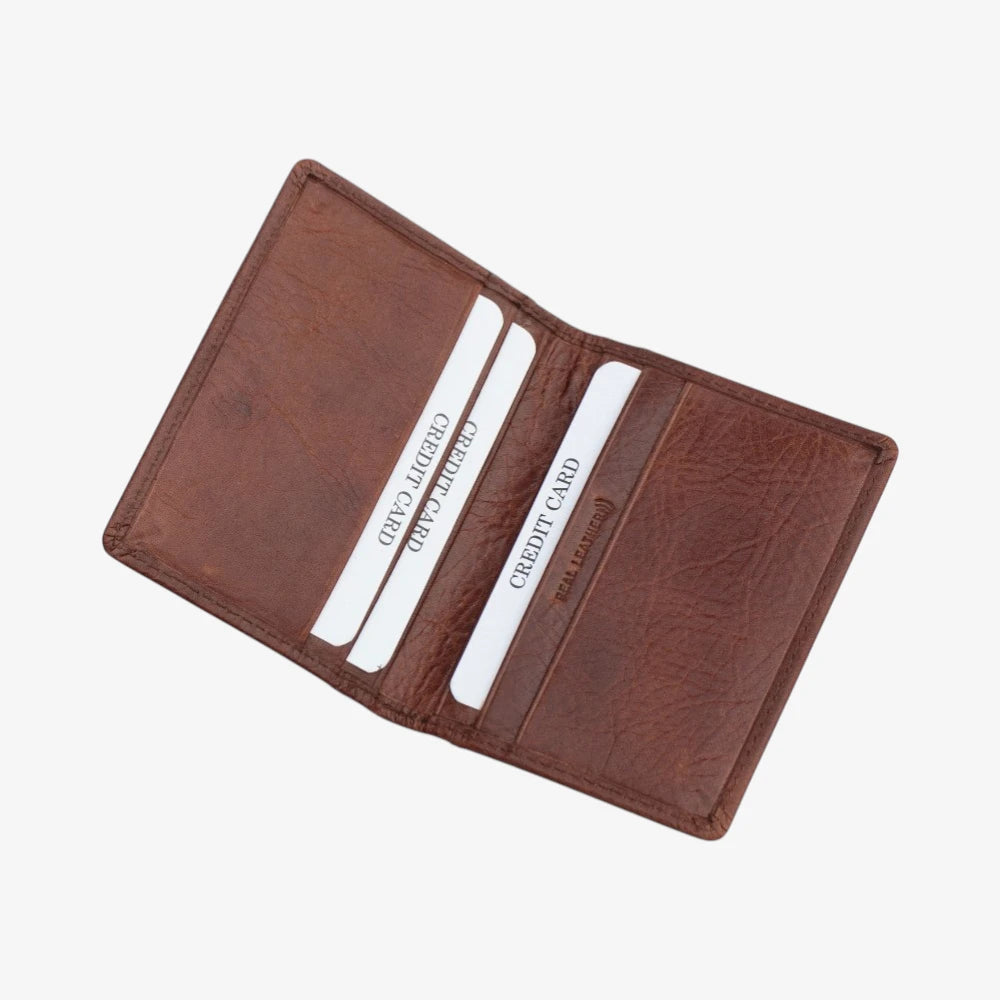 Brown leather wallet with three card slots on a white background