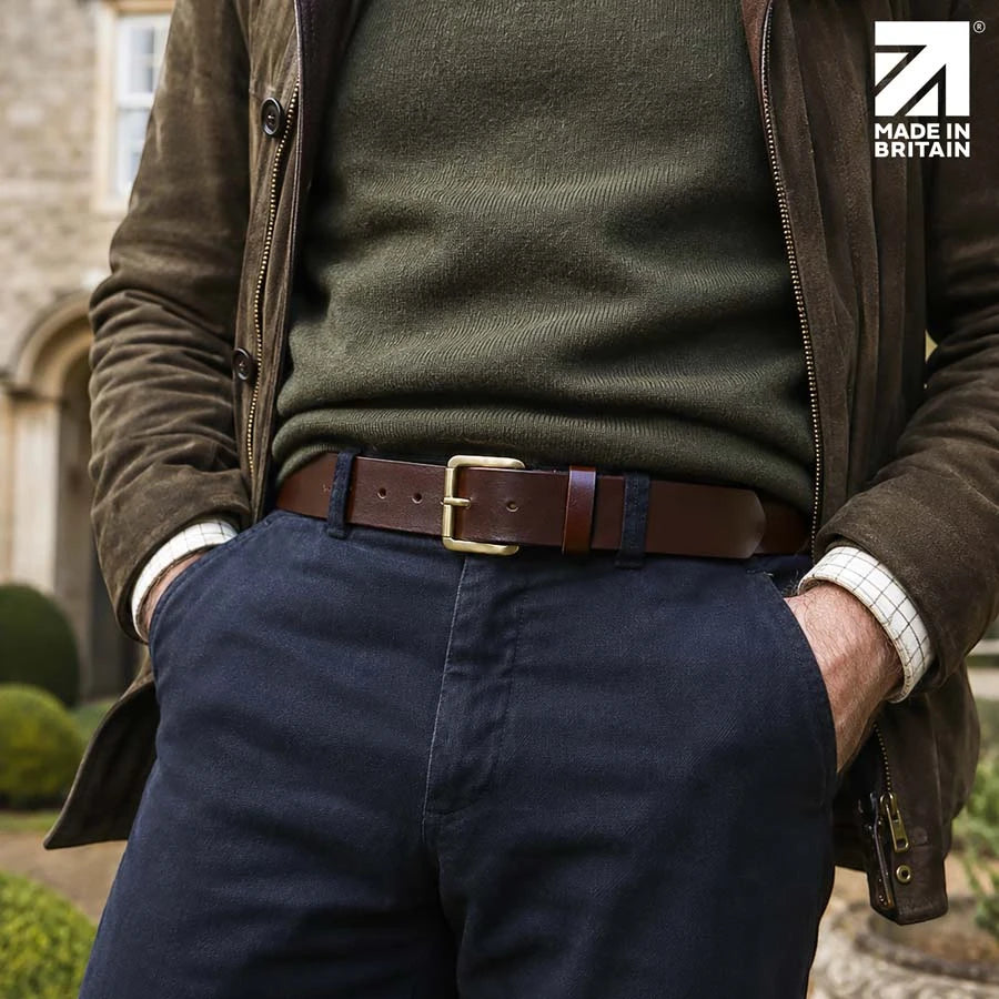 Men’s brown 40mm full-grain Italian leather belt worn with navy trousers