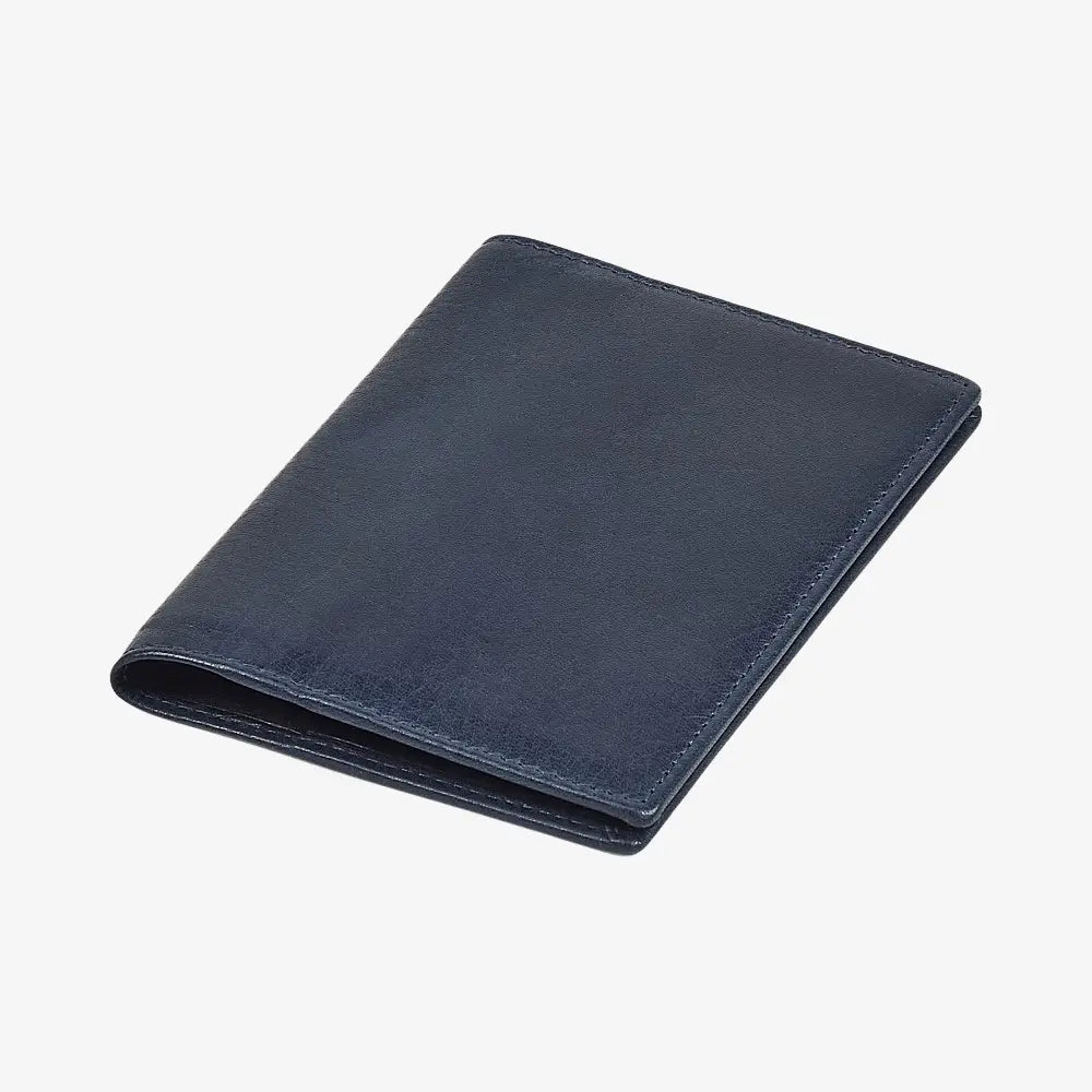 Side view of Navy leather passport holder on a white background
