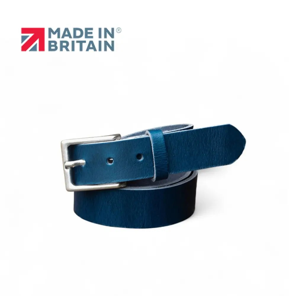 Navy leather belt with silver buckle on a white background, featuring 'Made in Britain' logo.