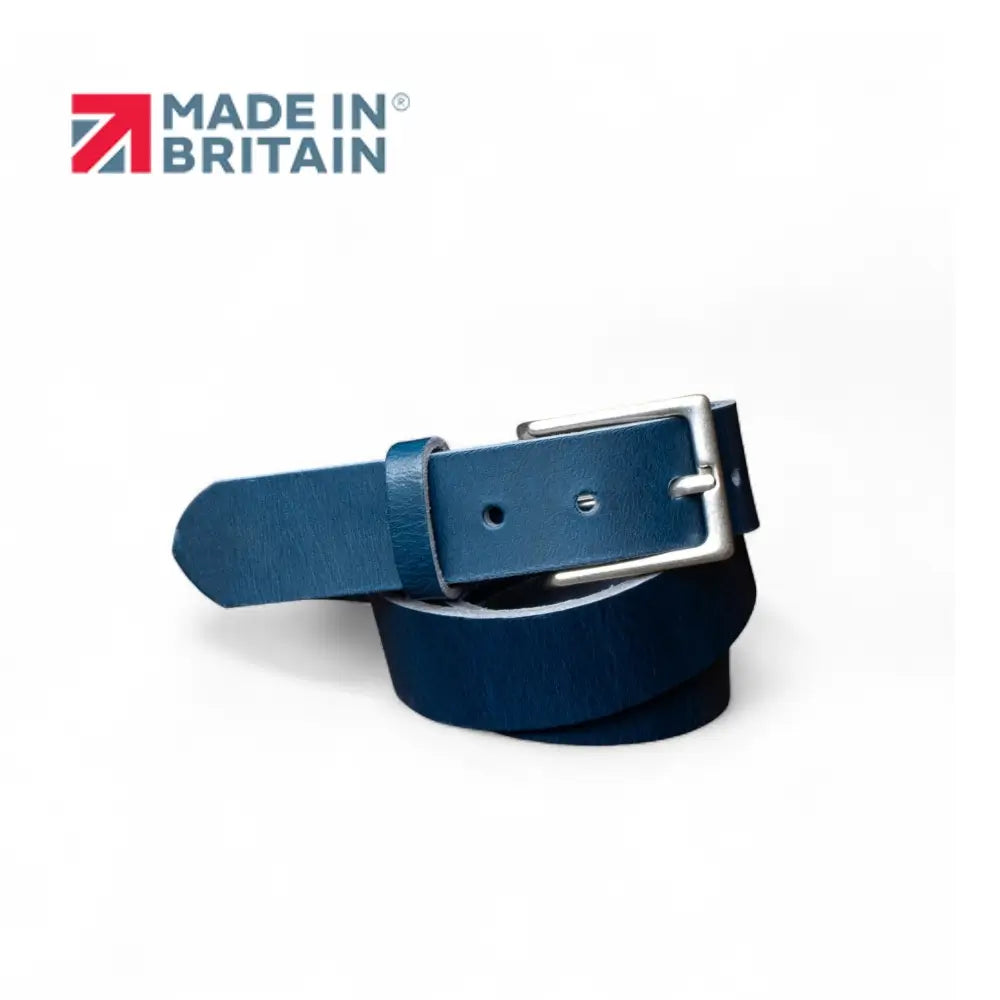 Navy leather belt with silver buckle on a white background, featuring 'Made in Britain' logo.
