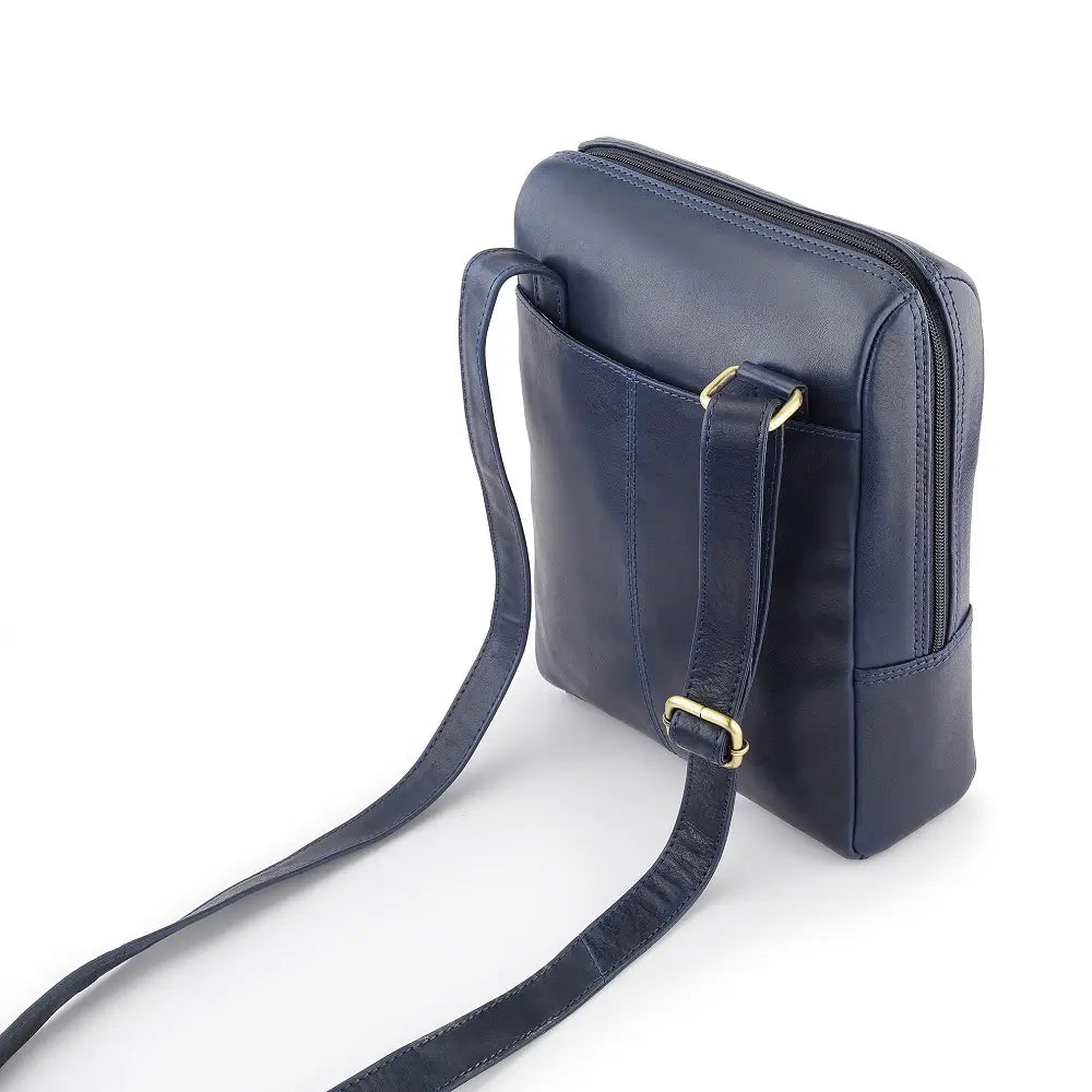 Navy leather messenger bag with gold hardware on a white background