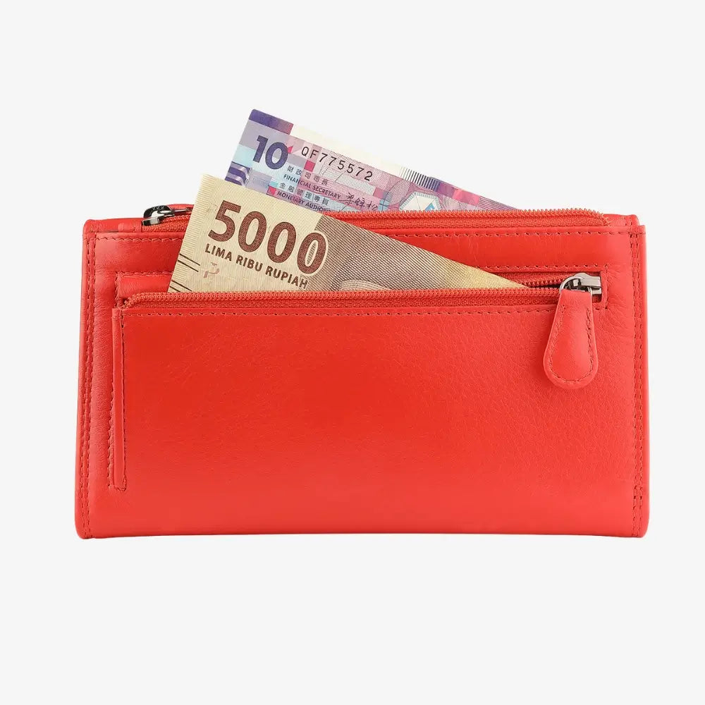 Back view of Orange wallet with Indonesian banknotes inside on a white background
