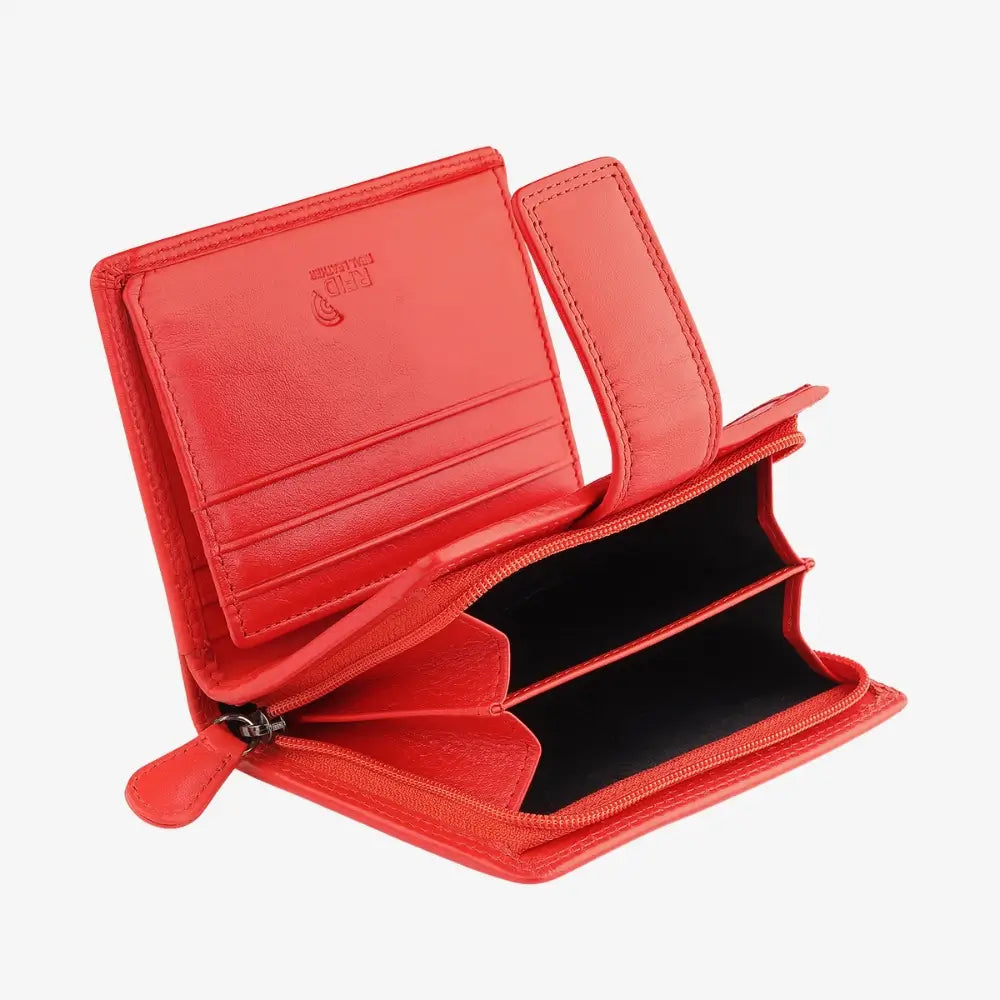 Inside view of soft orange leather trifold purse with secure tab fastening