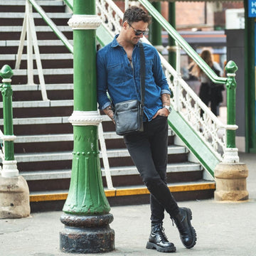 Black leather man bag flight bag.