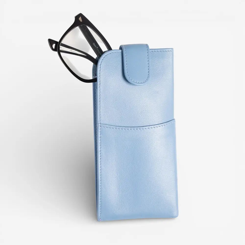 Pastel blue glasses case with a pair of glasses on a white background