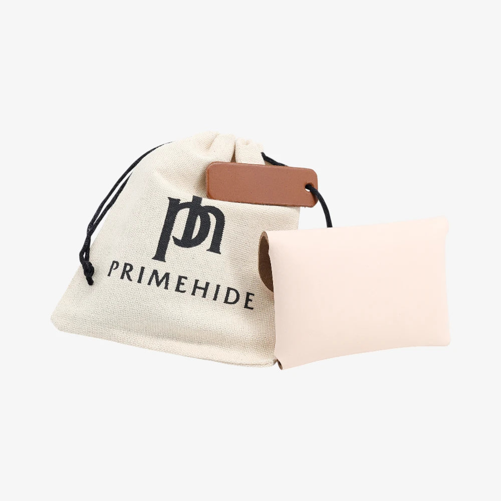 Back view of peach leather coin purse with textured finish and branded pouch