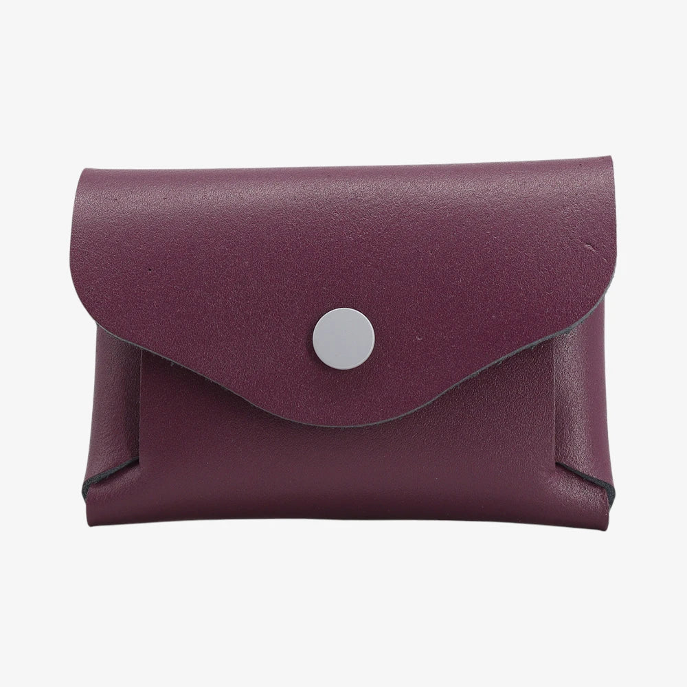 Plum leather coin purse with textured finish and snap button flap closure