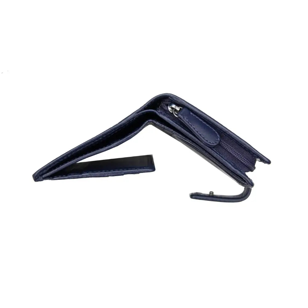 Soft purple leather trifold purse with secure tab fastening – angle view