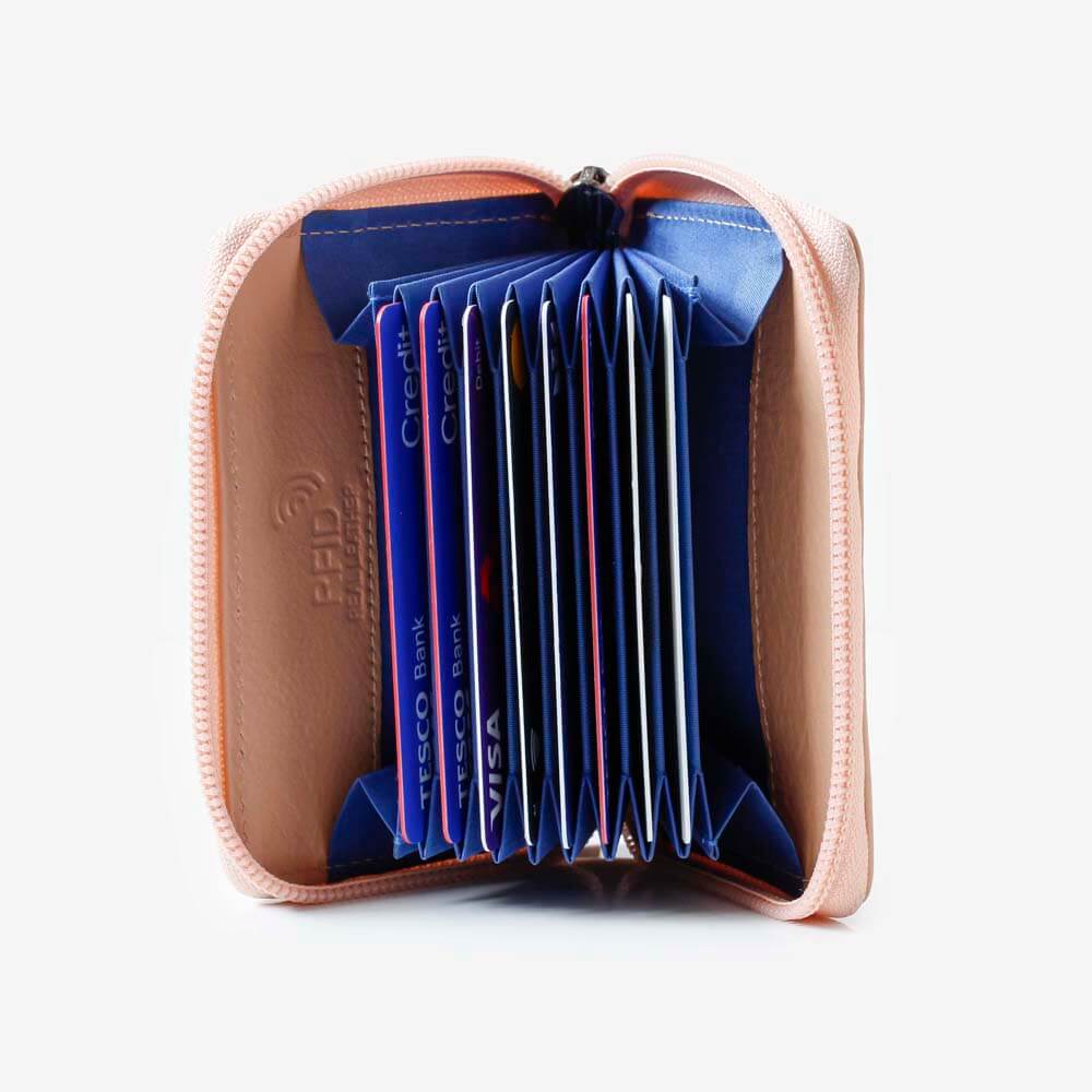 PRIMEHIDE Soft leather card holder wallet with zip closure in a peach colour