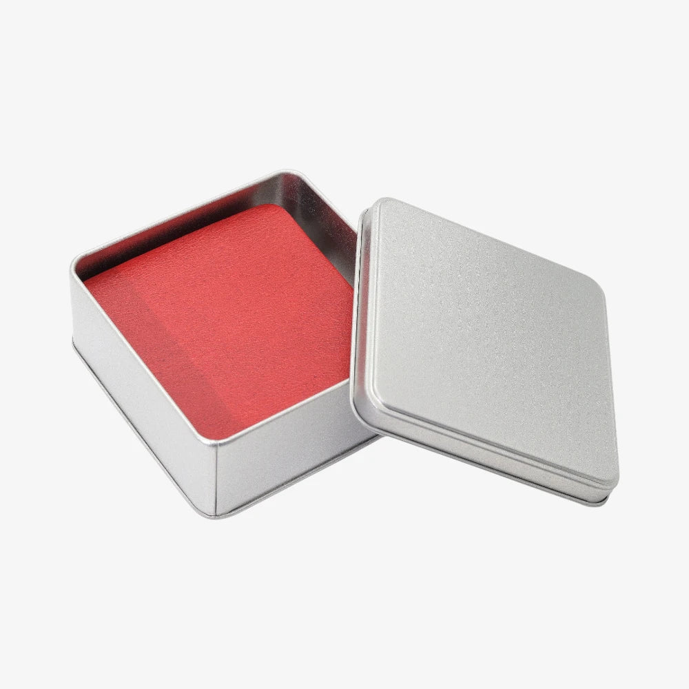 Elegant Red leather coaster set for entertaining in a metallic container on a white background