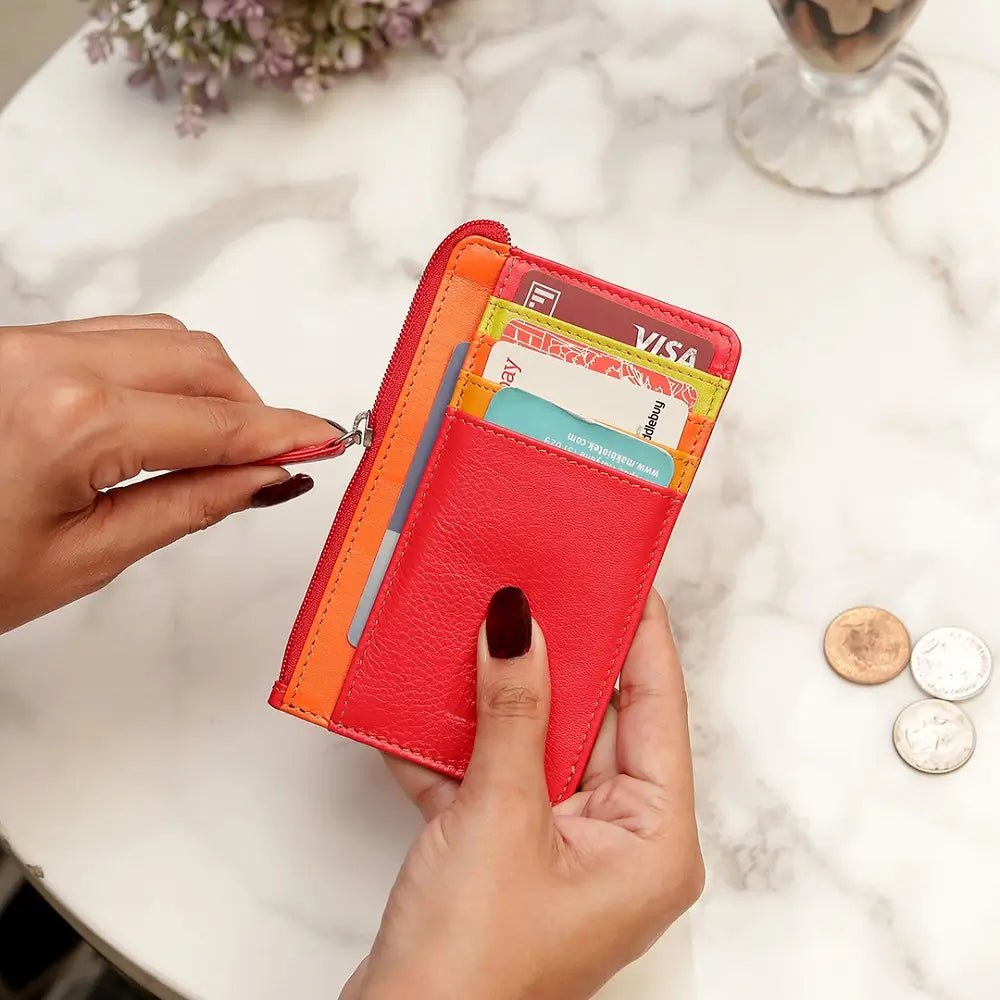 Red Card Holder Purse with card slots held by a hand on a light surface.