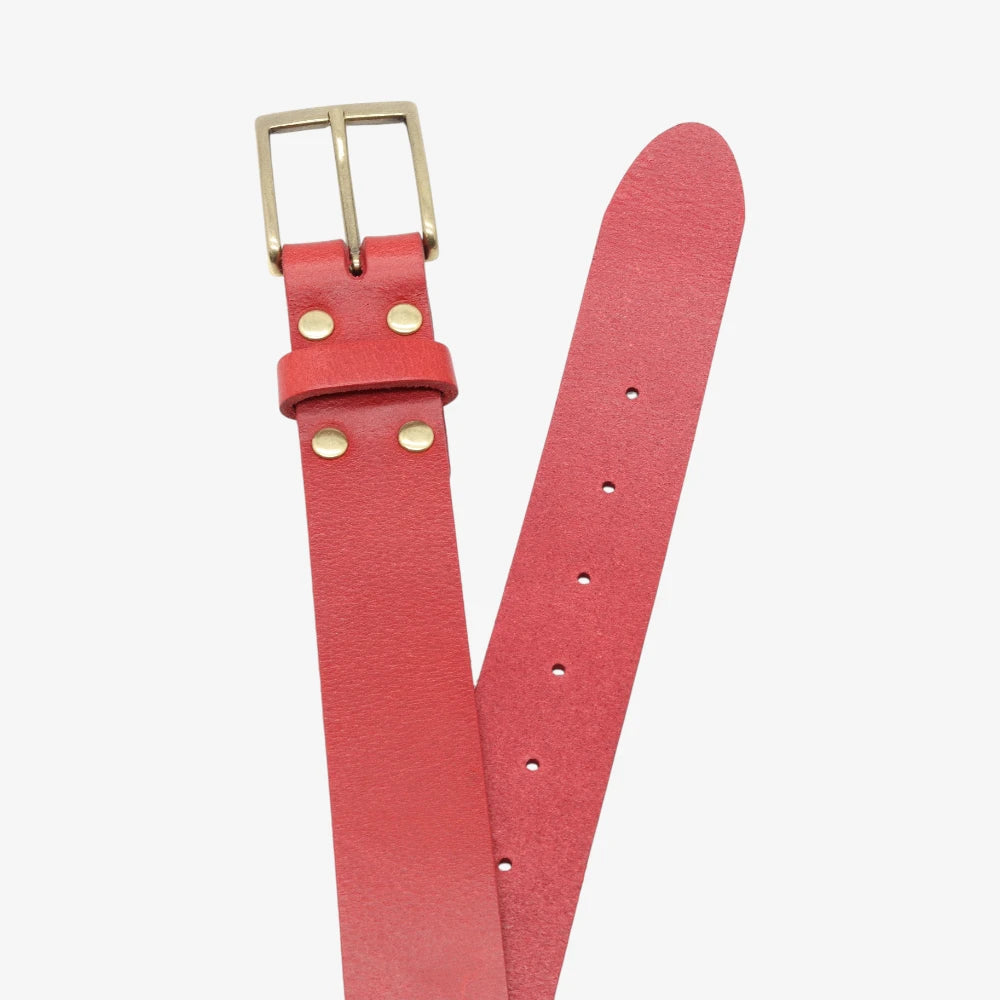 Top angle view of Red belt with gold buckle on a white background