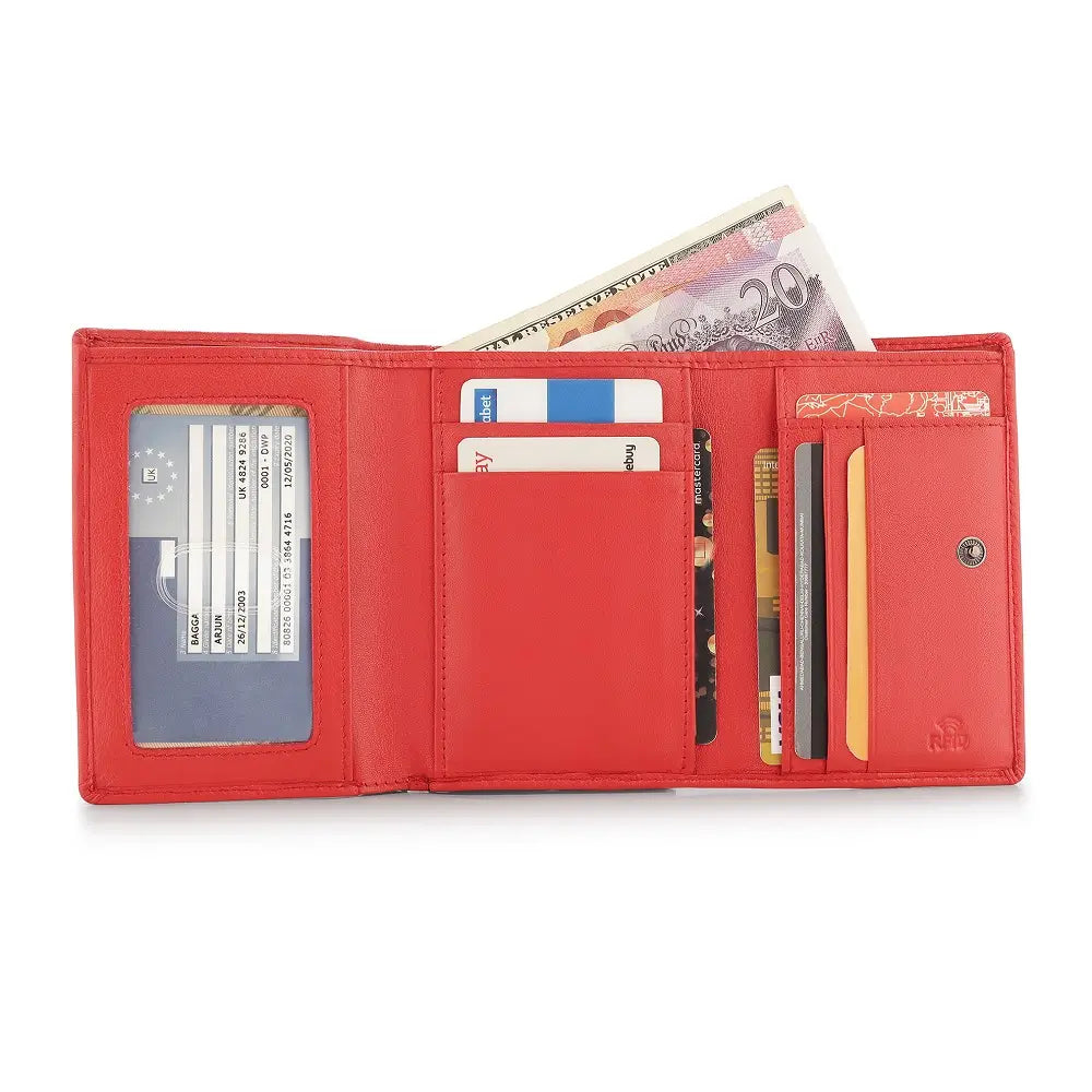 Red wallet open to show card slots and currency on a white background