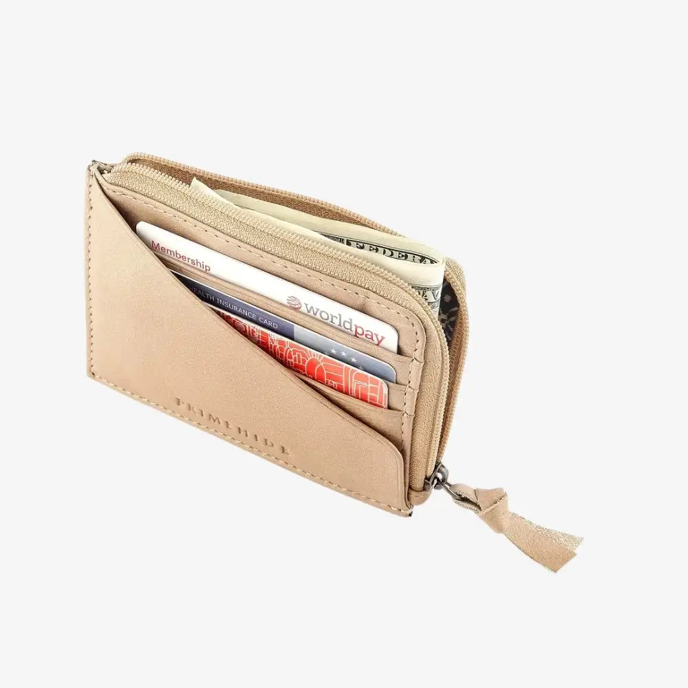 Sand wallet with cards and money on a white background