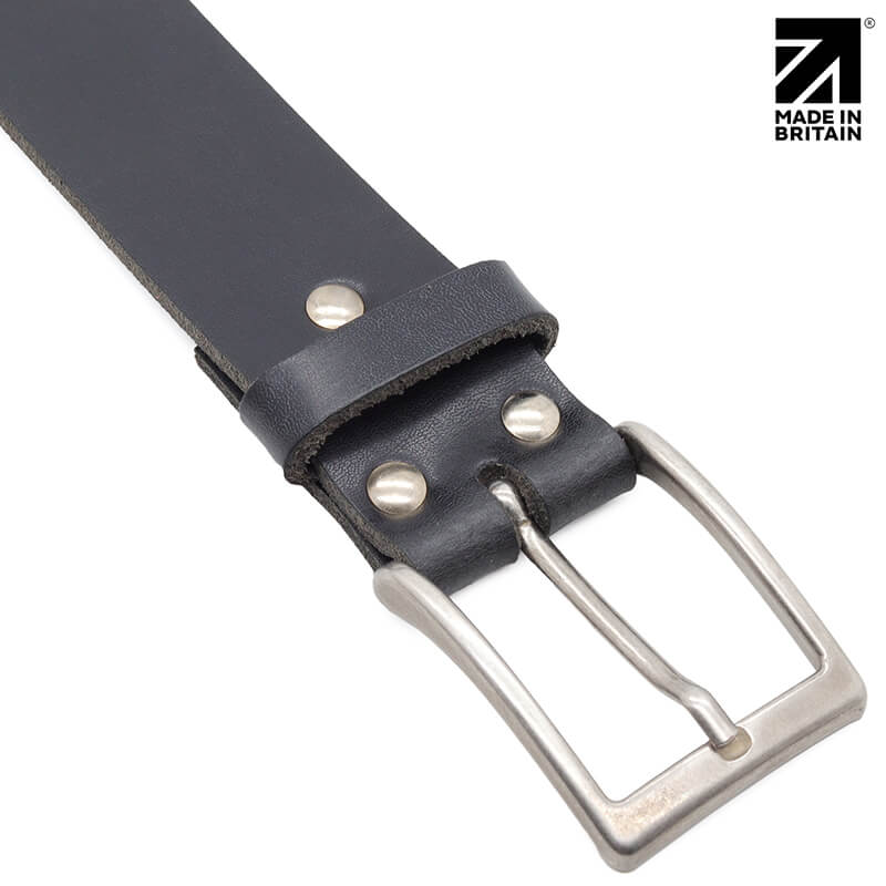 Close-up of the silver pin buckle on a 35mm leather belt
