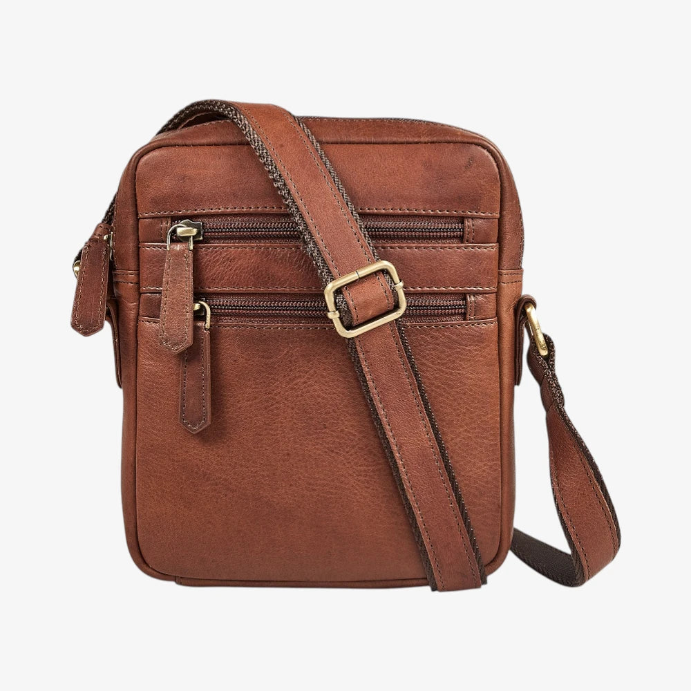 Brown leather crossbody bag on a white background