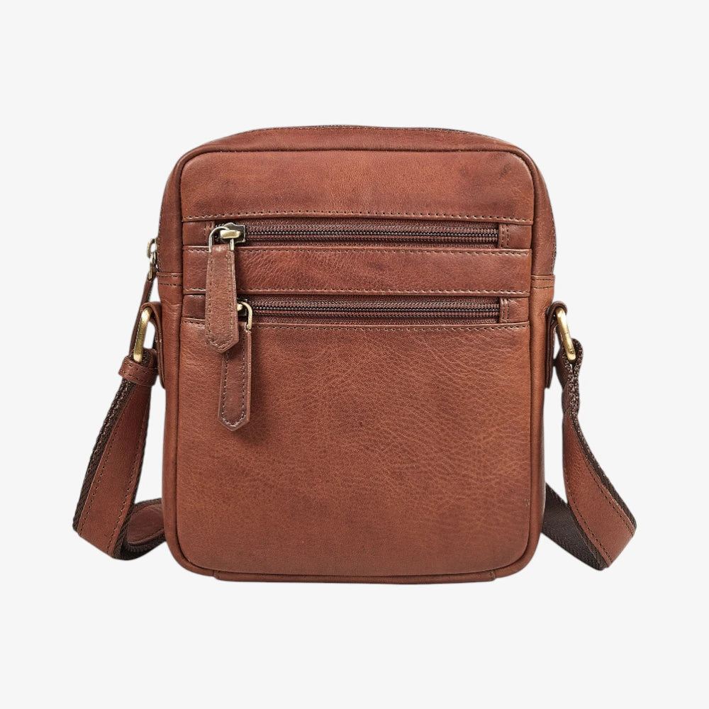 Brown leather crossbody bag on a white background