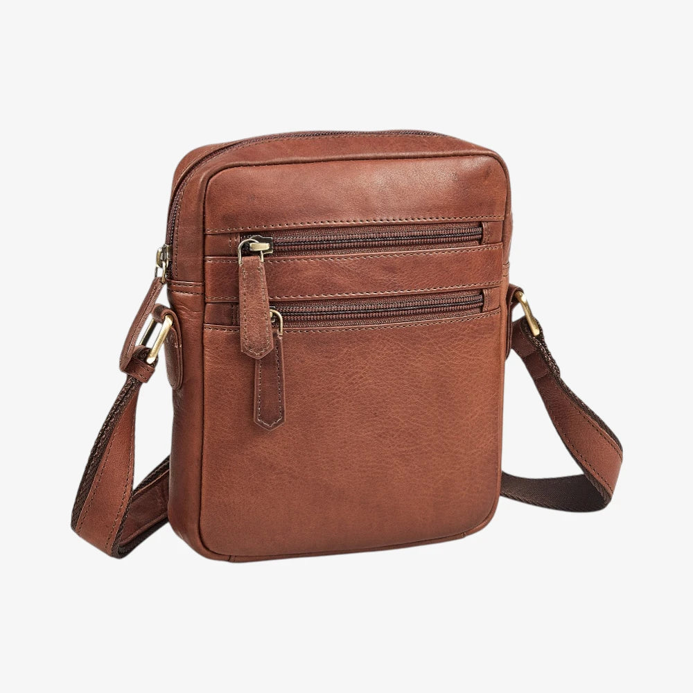 Brown leather crossbody bag on a white background