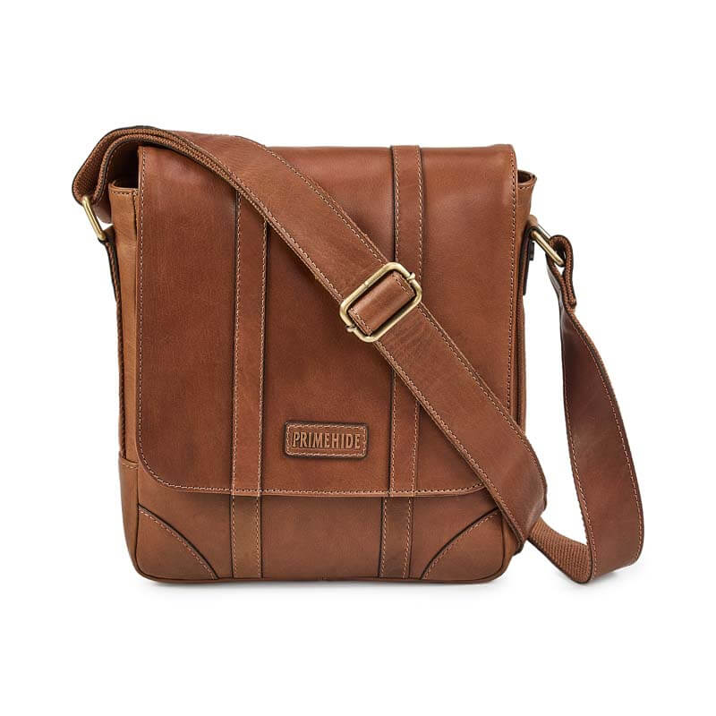 Brown leather crossbody bag with a visible brand logo on a white background
