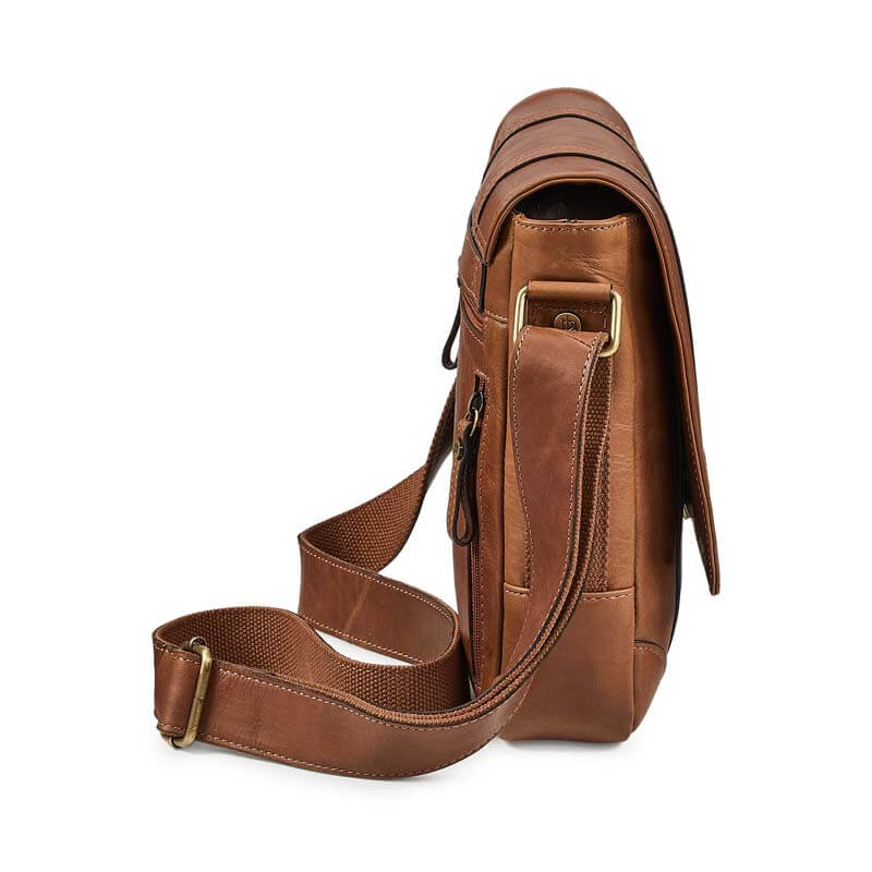 Brown leather shoulder bag on a white background