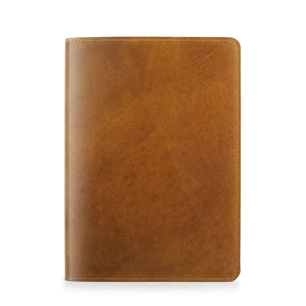 Tan leather diary cover on a white background
