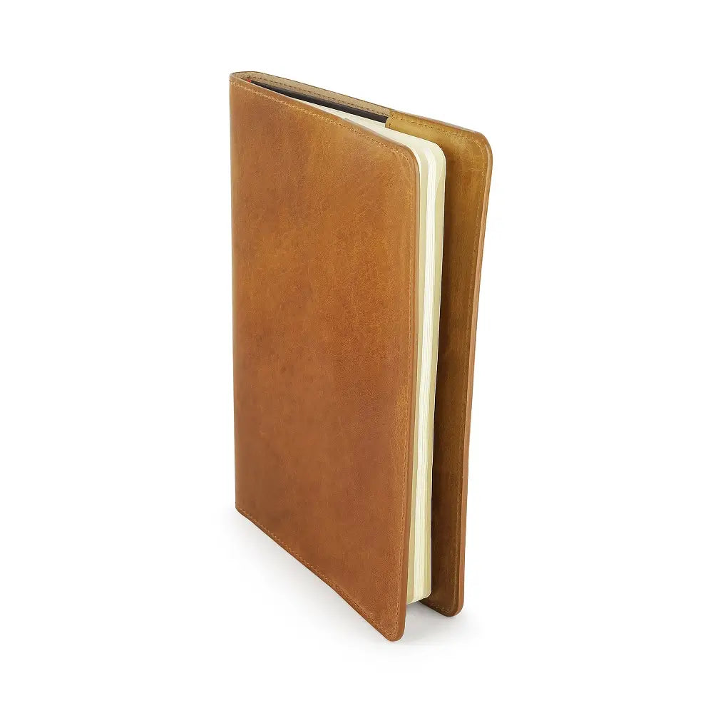 Tan  leather leather diary cover on a white background