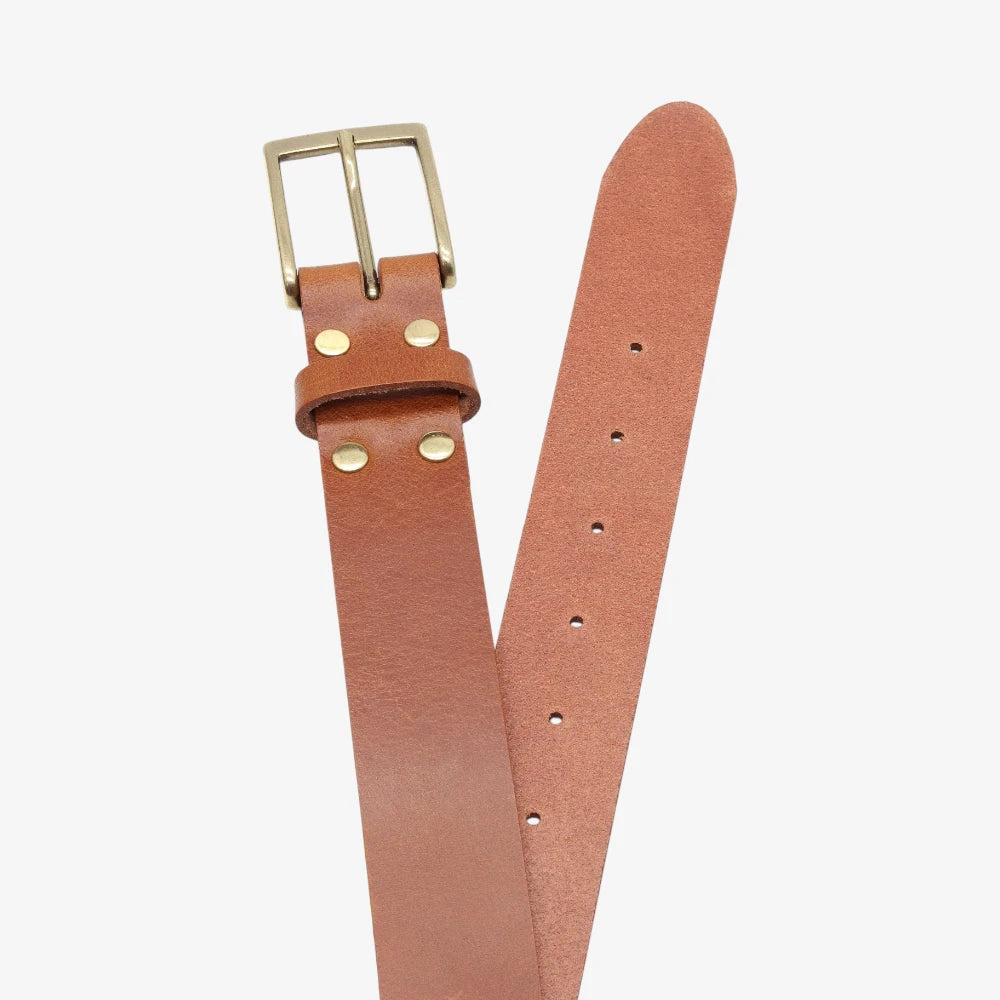 Top angle view of Tan  leather belt with brass buckle on a white background