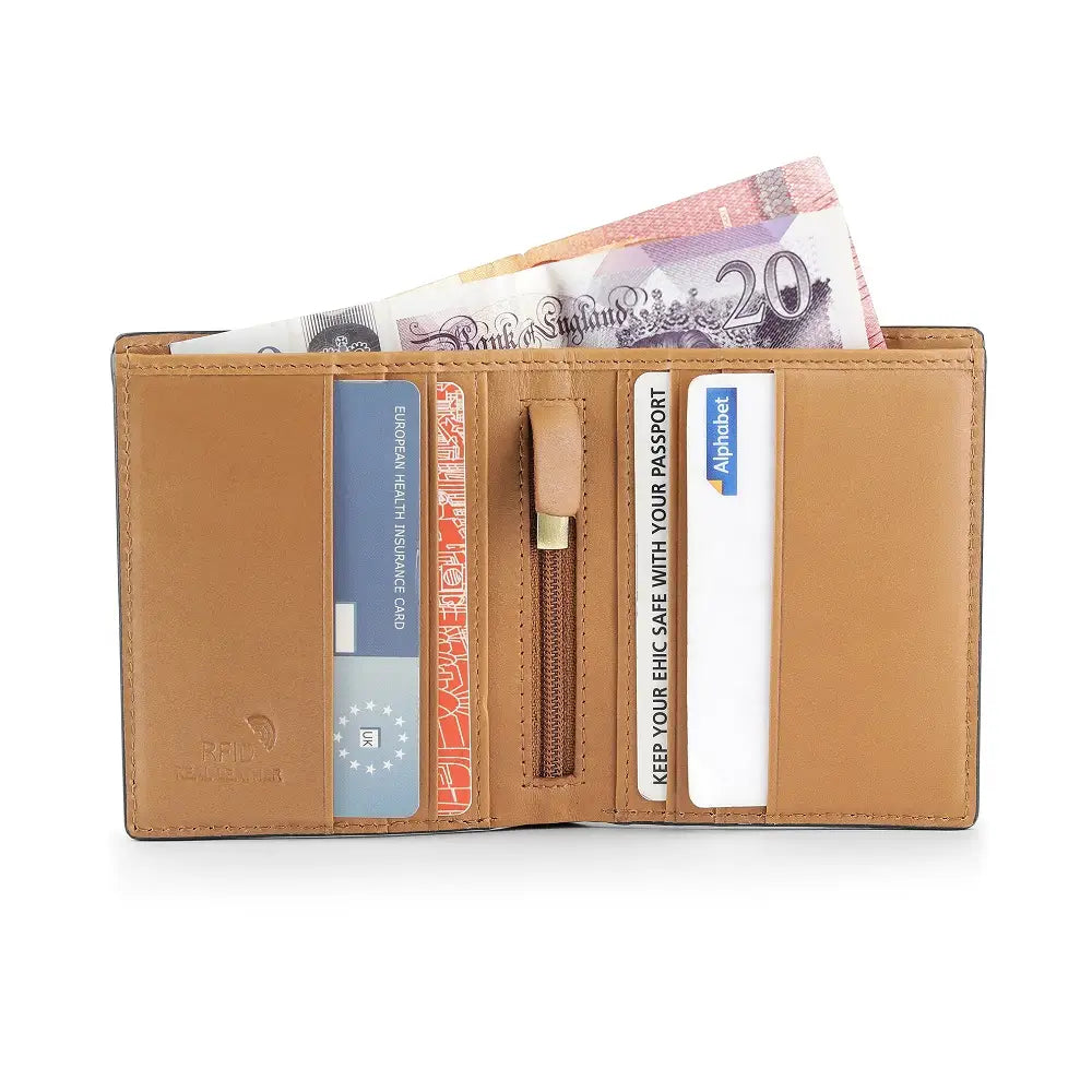 Tan leather wallet with money and cards on a white background