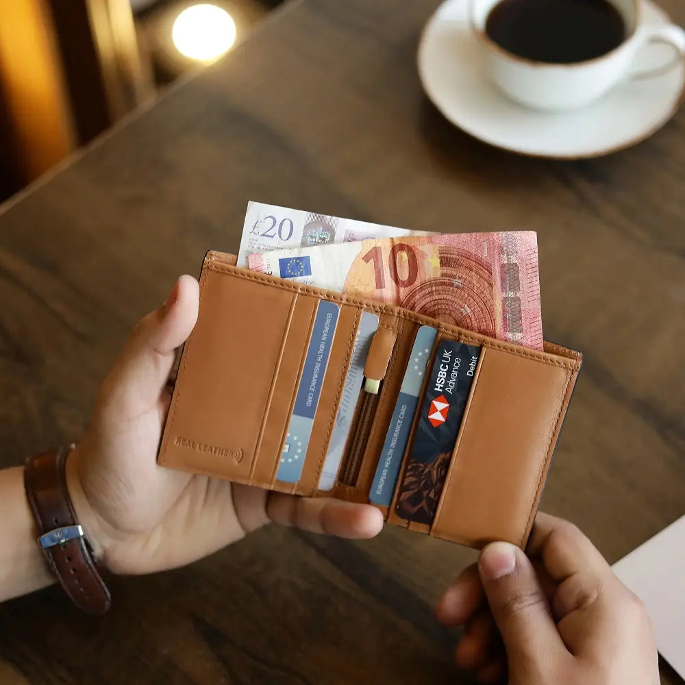 Front view of Tan leather wallet on a white background