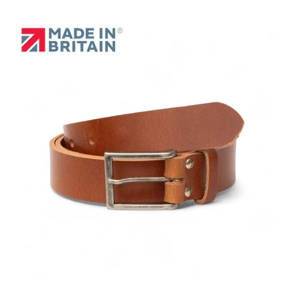 Tan leather belt with a silver buckle on a white background, featuring the 'Made in Britain' logo.