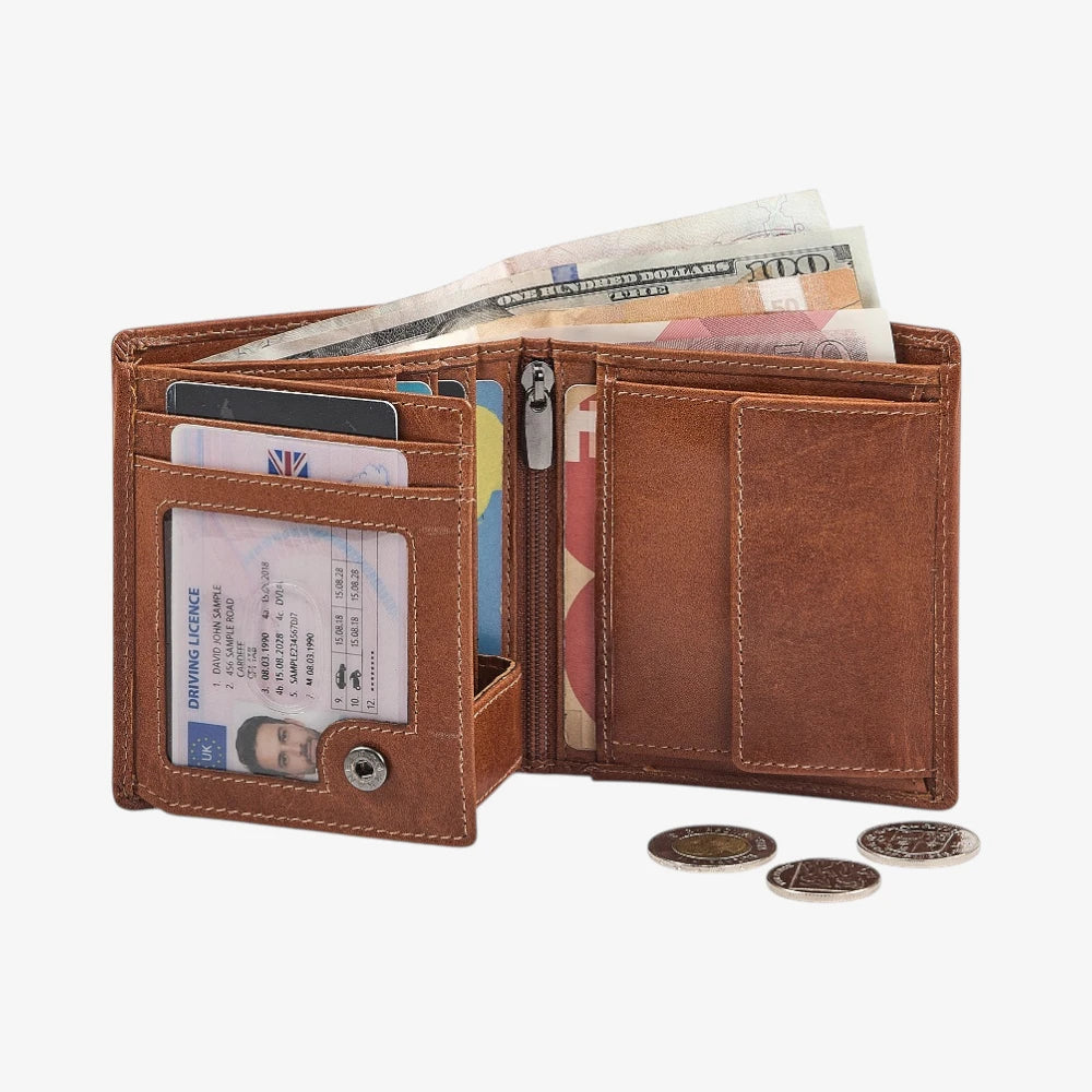 Tan leather wallet with various cards, money, and coins on a white background