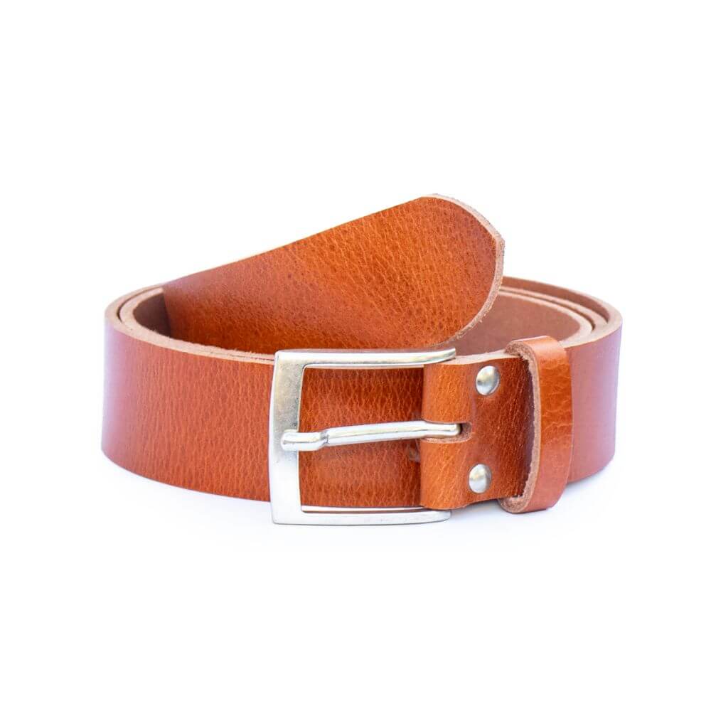 Brown leather belt with a silver buckle on a white background
