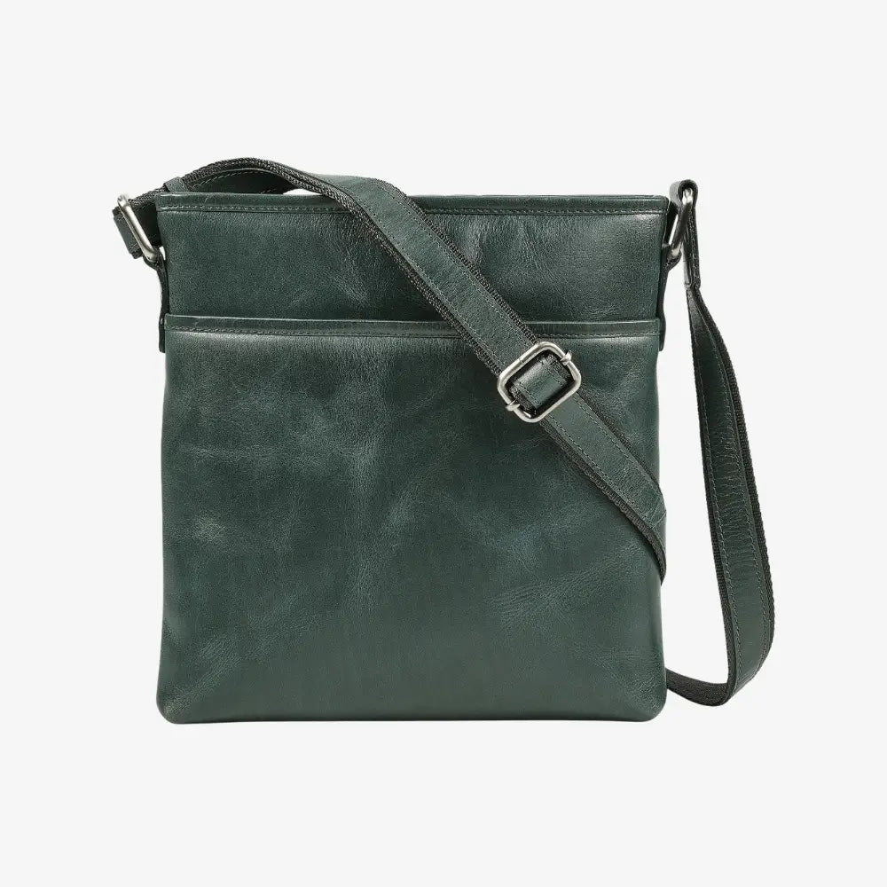 Teal leather crossbody bag on a white background