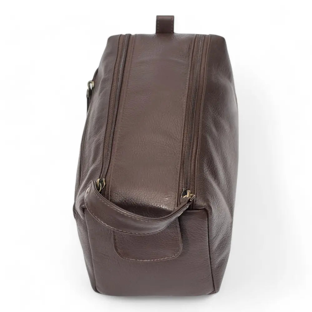 Brown leather backpack on a white background