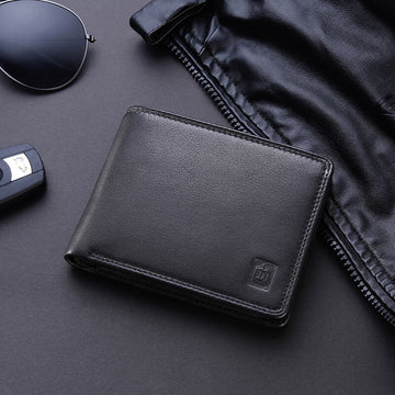 Lifestyle view of Black leather wallet with a brand logo